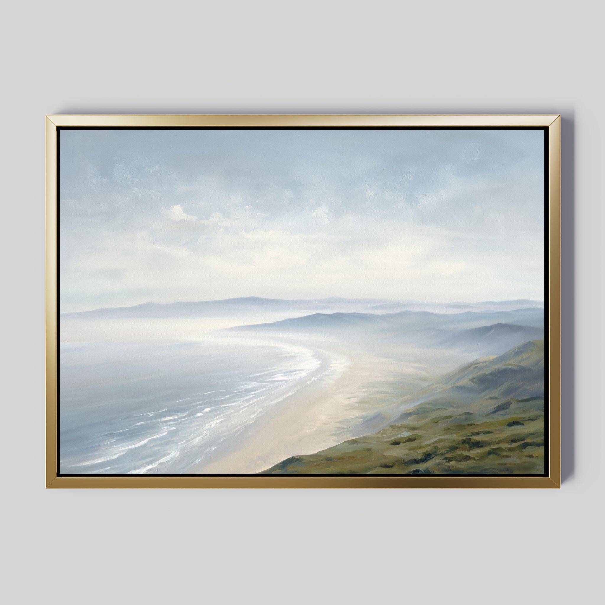 The Veiled Shores Canvas Art - Horizontal features a framed coastal landscape with gentle waves, sandy shoreline, green hills, and a soft cloudy sky.