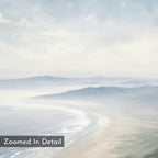 The Veiled Shores Canvas Art - Horizontal features a soft, painterly coastal beach landscape with gentle waves, misty distant mountains, a cloudy sky, and a dreamy, tranquil vibe. "Zoomed In Detail" appears in the corner.