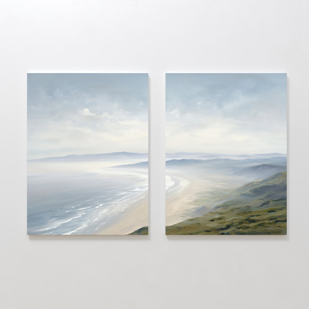 The "Veiled Shores - Set of 2" features serene canvas wall art depicting sandy coasts, gentle waves, and green hills beneath a cloudy sky, displayed side by side on a white wall.