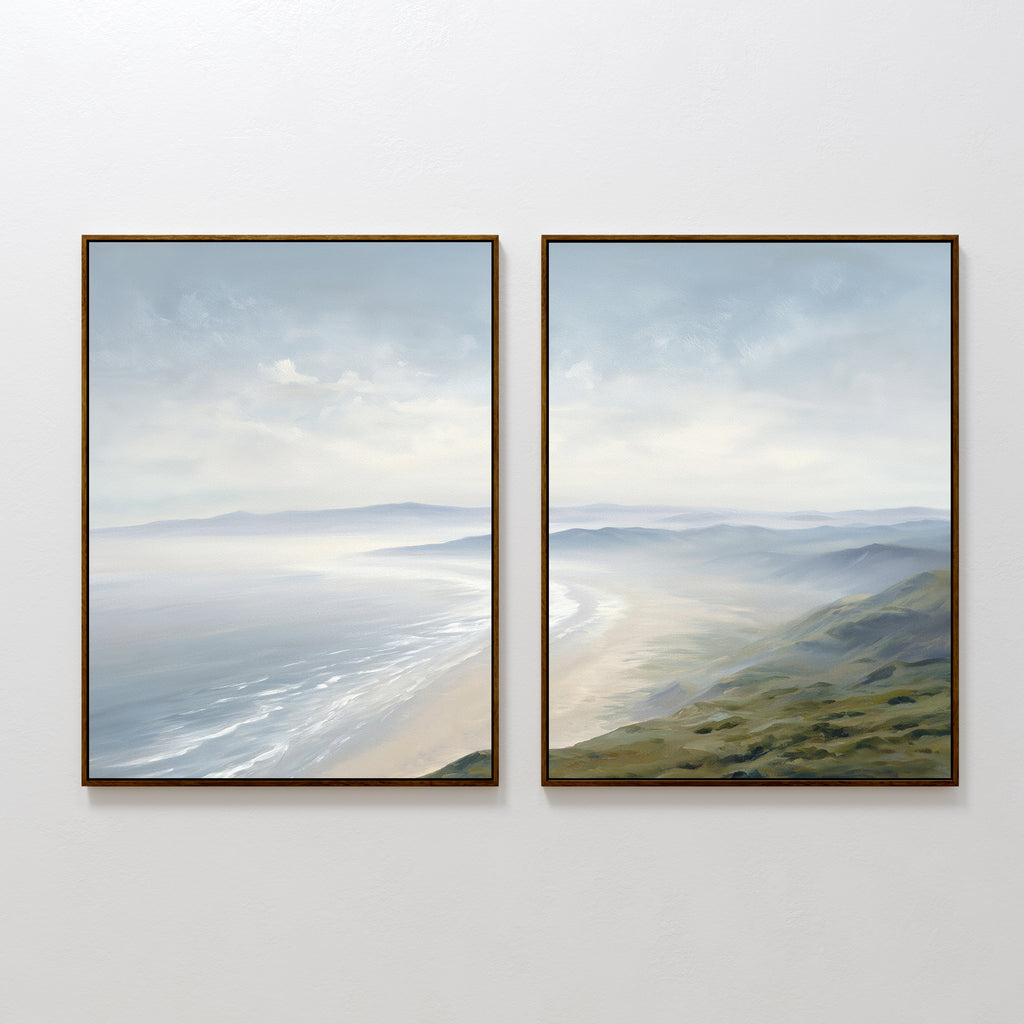The Veiled Shores - Set of 2 features framed coastal canvas paintings showing gentle waves, misty hills, and serene skies in calming blue and green tones, perfect for tranquil wall art.