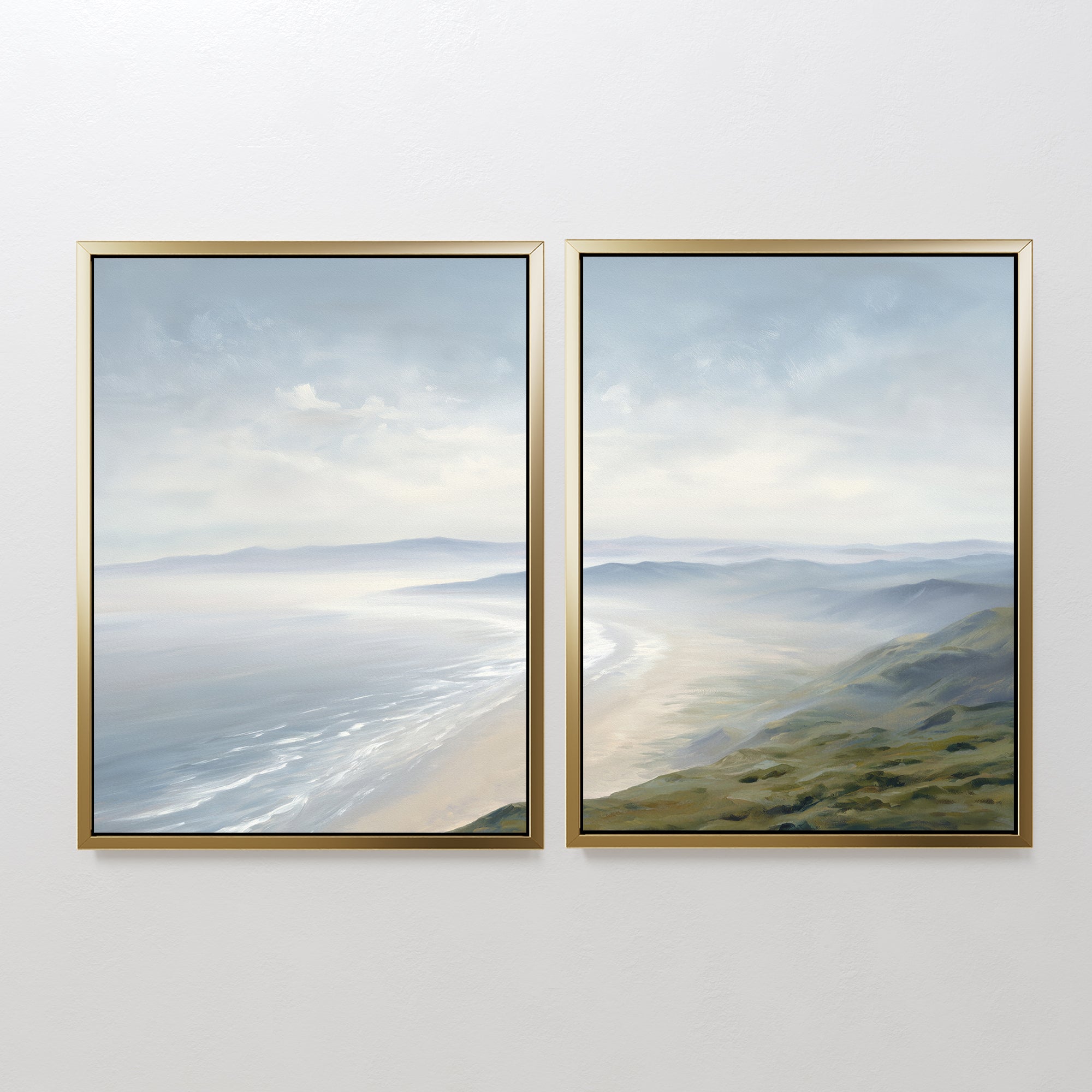 Veiled Shores - Set of 2: This pair of framed coastal canvases features serene wall art with sandy beaches, gentle ocean waves, distant hills, and a cloudy sky in soft blues, greens, and neutrals.