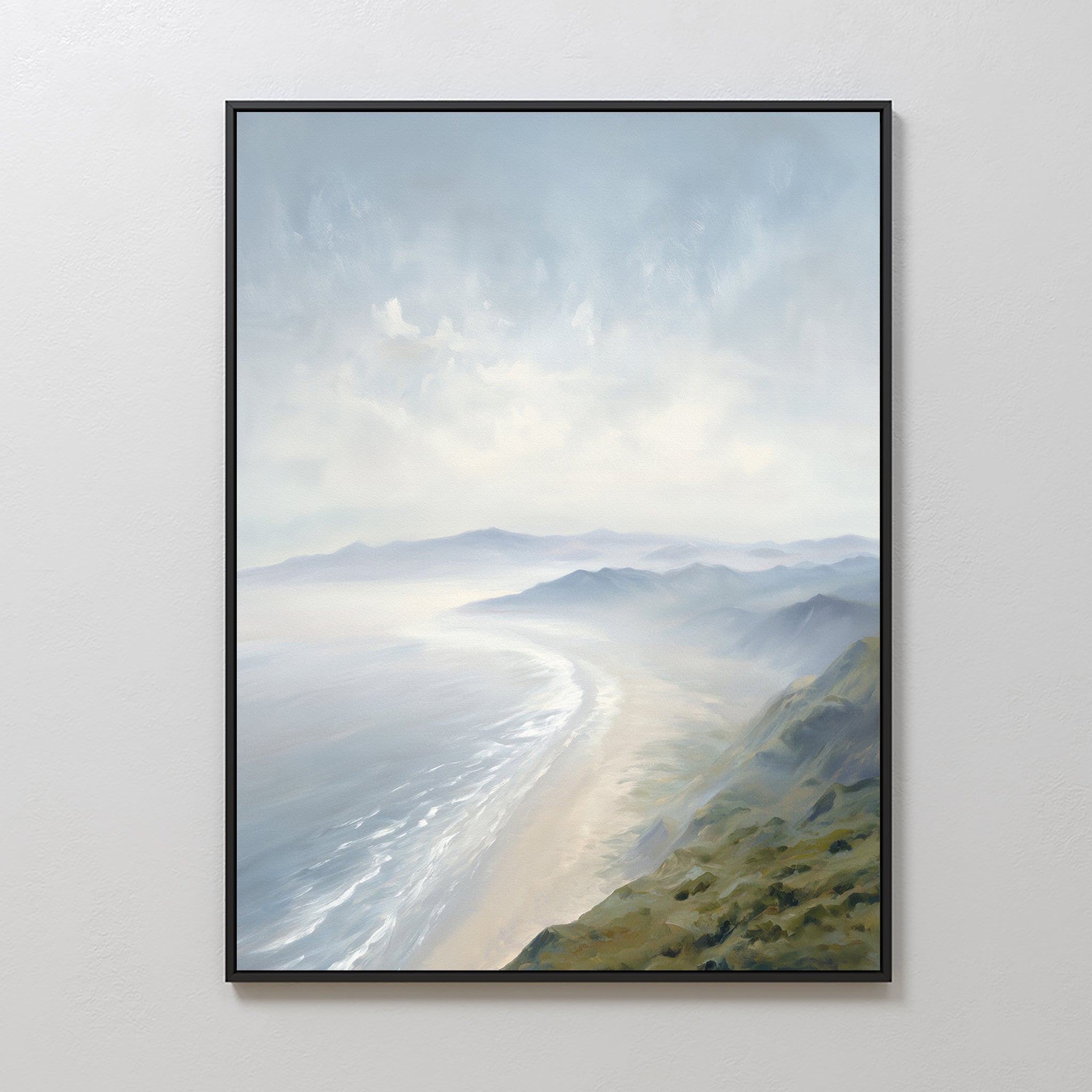 The Veiled Shores Canvas Art - Vertical features soft waves, sandy shores, and misty mountains under a cloudy sky, adding tranquil coastal style to any plain white wall.