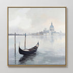 The Venetian Stillness Canvas Art - Square features a gondola on tranquil waters with wooden posts and a domed building in the mist, capturing the timeless European charm of Venice in a beautiful framed canvas print.