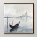 The Venetian Stillness Canvas Art - Square depicts a gondola gliding on tranquil waters, misty buildings, and a domed cathedral, capturing the serene European charm of Venice in a framed canvas print.