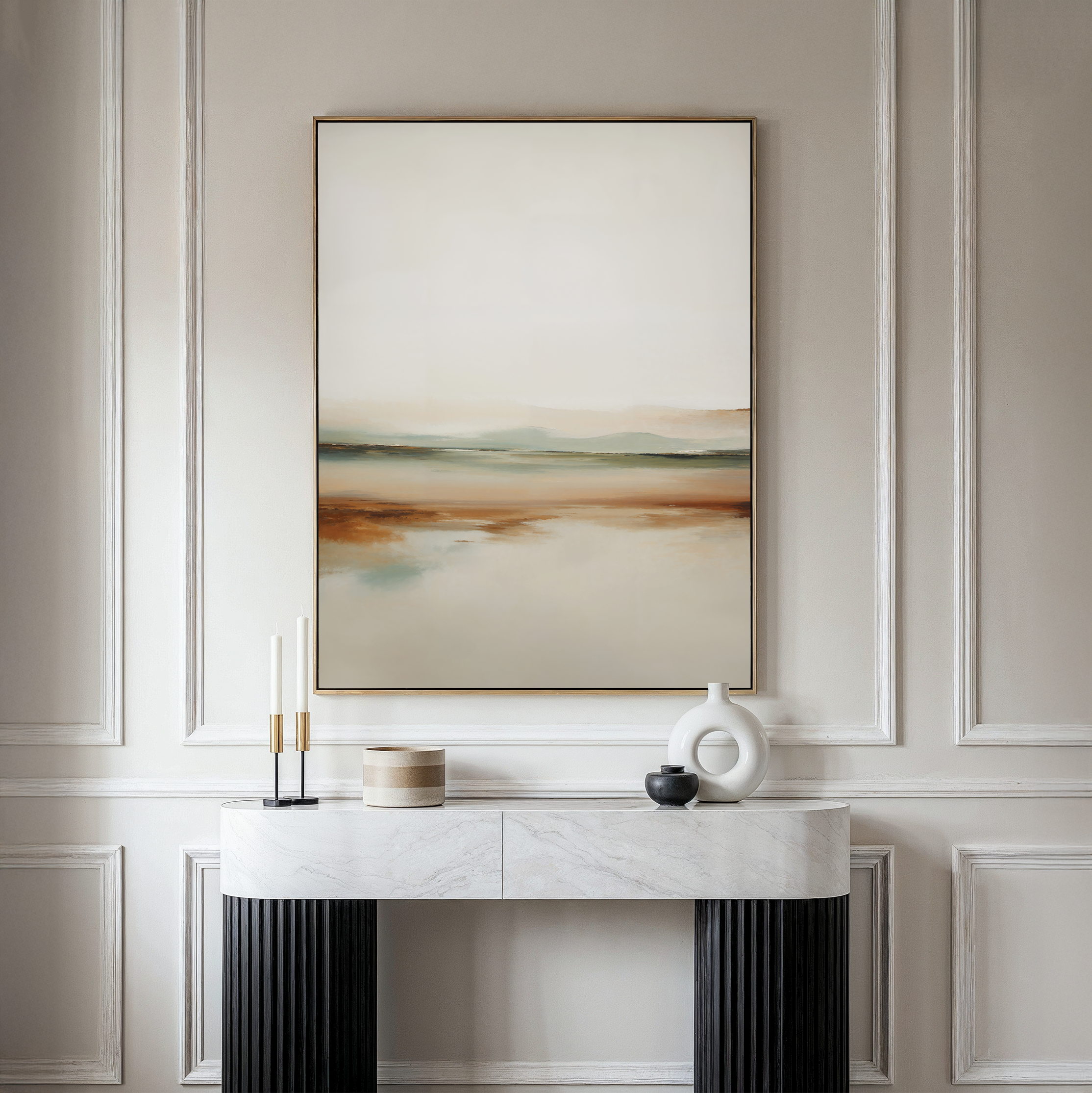 A minimalist console table with decor stands against a paneled wall, topped by the Earthly Hues Abstract Canvas Art—a modern landscape in neutral tones—completing this sophisticated living room decor scene.