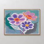The Vibrant Petals Canvas Art - Horizontal showcases three colorful flowers—two purple with yellow centers, one orange with a pink center—on a blue-green backdrop and dark green leaves, ideal for contemporary floral wall decor.