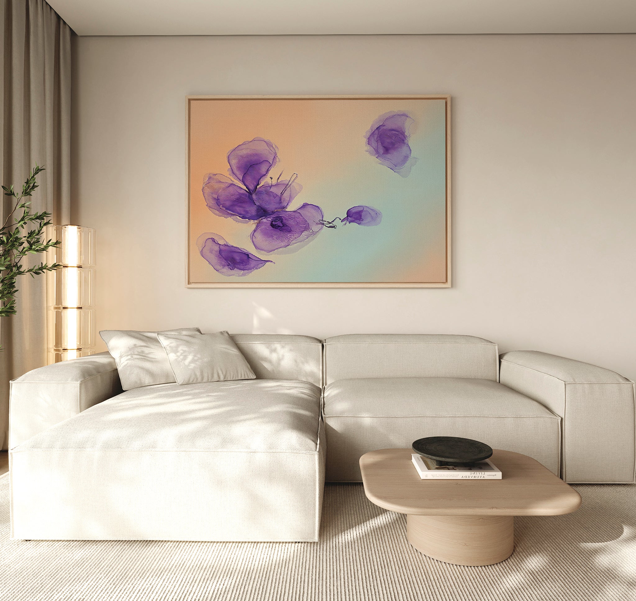 A modern living room with a light beige sectional, wooden coffee table, and the Violet Dreams Canvas Art - Horizontal featuring abstract purple flowers on a peach-blue gradient, displayed above the sofa.