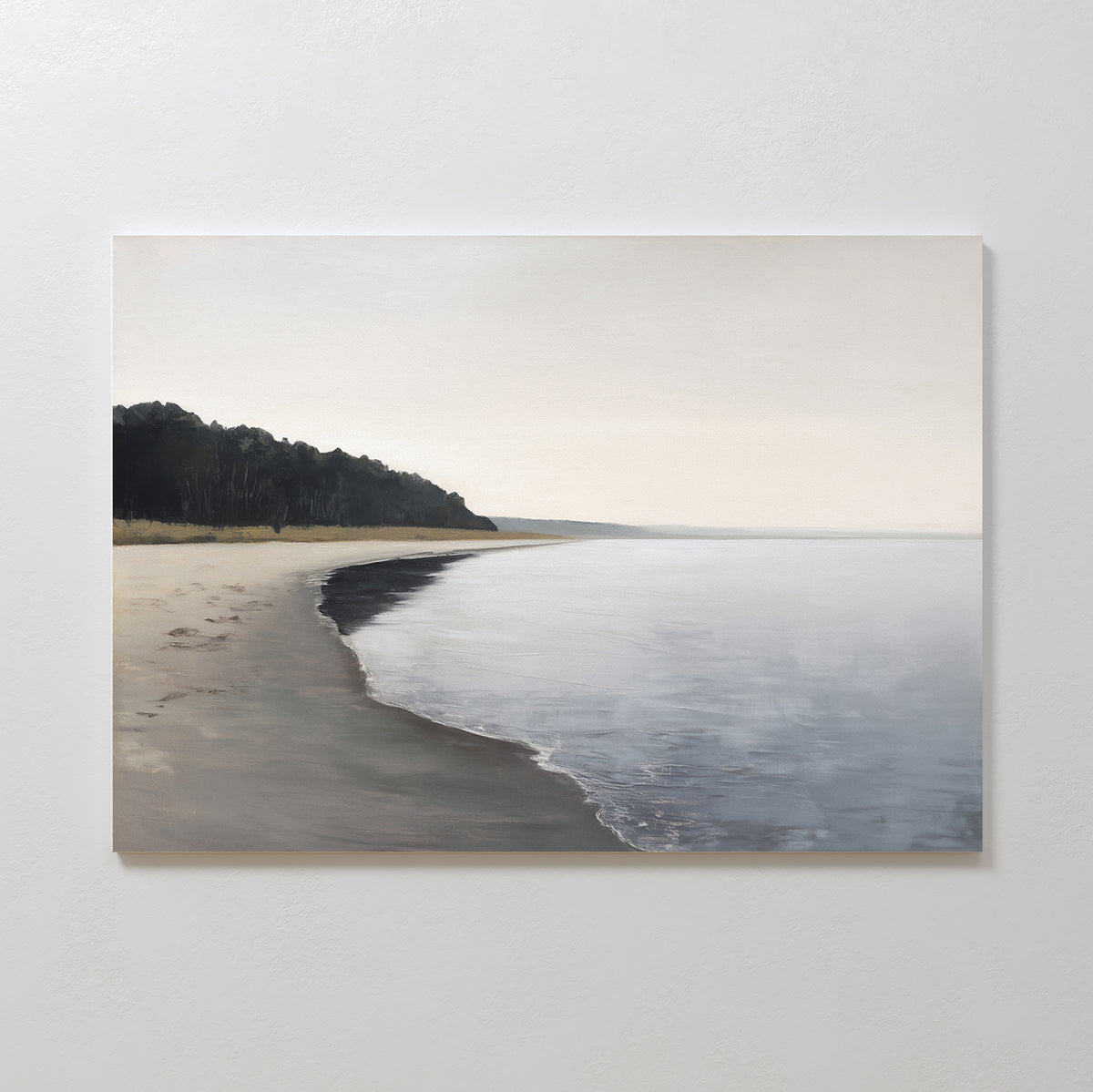 Weathered Shore Canvas Art - Horizontal depicts a calm beach with gentle waves, a curving sandy coastline, and trees under an overcast sky—ideal shoreline wall art for serene spaces.