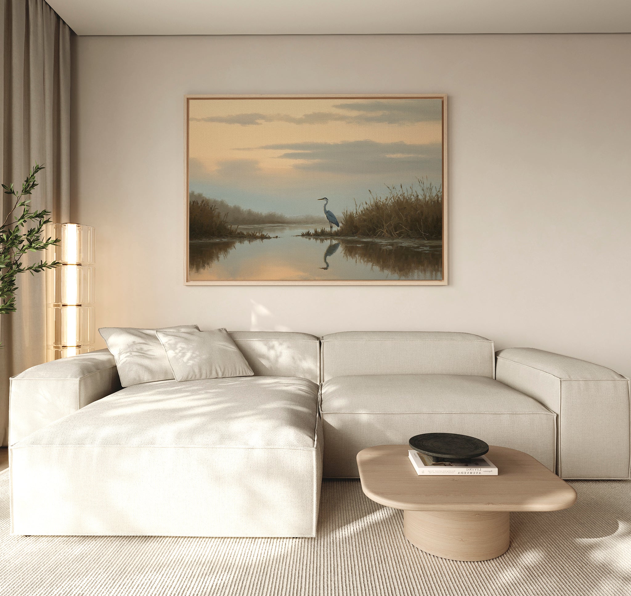 A modern living room with a light beige sectional, wooden coffee table, and striking Wetland Heron Canvas Art - Horizontal—Nordic Park marsh landscape decor—illuminated by soft natural light drifting through curtains.
