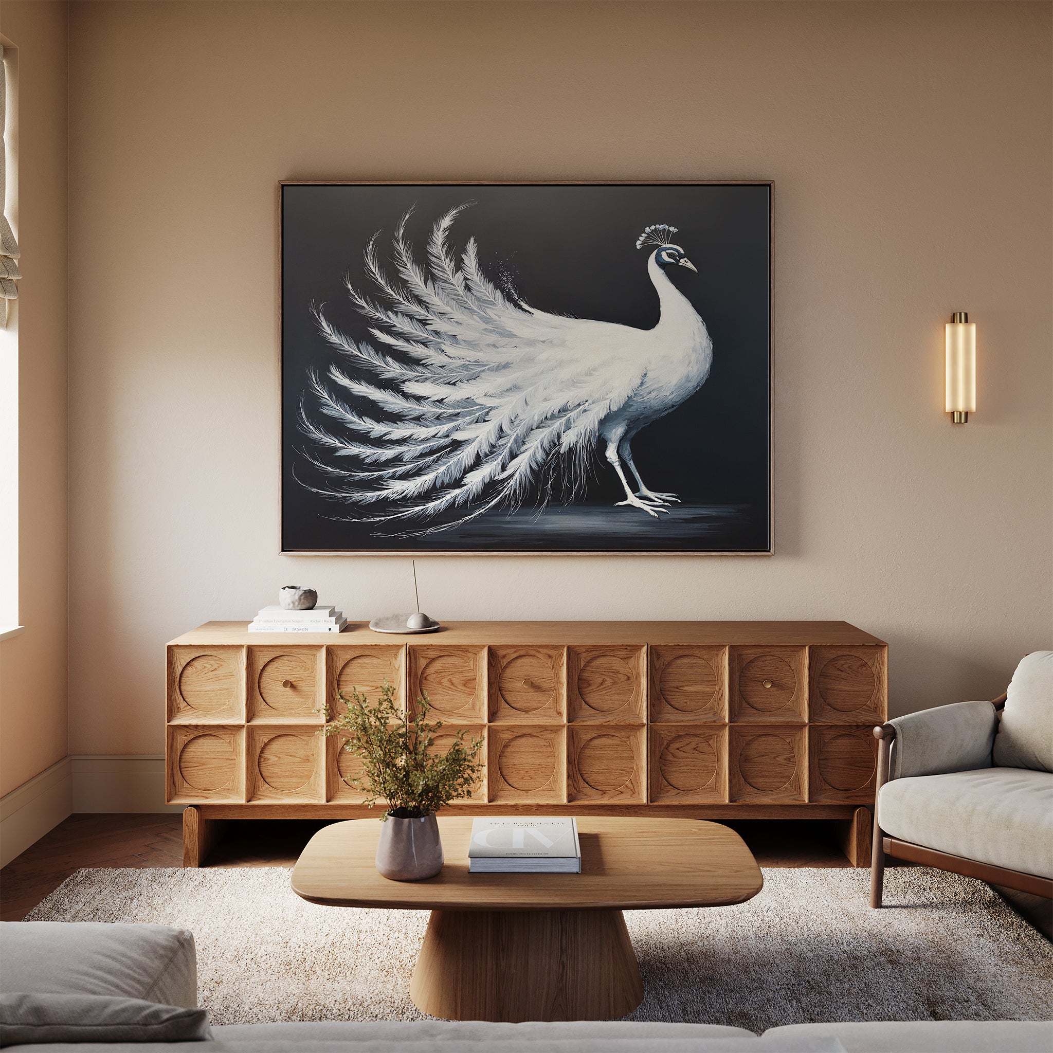 A living room with a wooden sideboard, the White Peacock Display Canvas Art - Horizontal above it, a beige sofa, a wooden coffee table with book and vase, neutral walls, and soft natural light.