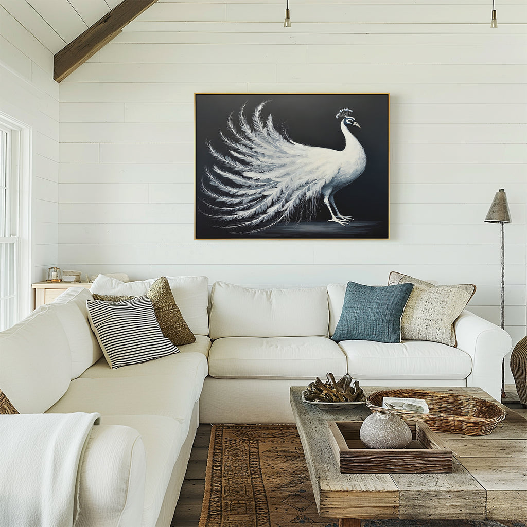 A bright living room with white shiplap walls, a large white sectional, an assortment of pillows, a rustic wooden coffee table, and the White Peacock Display Canvas Art - Horizontal elegantly hung above the sofa.