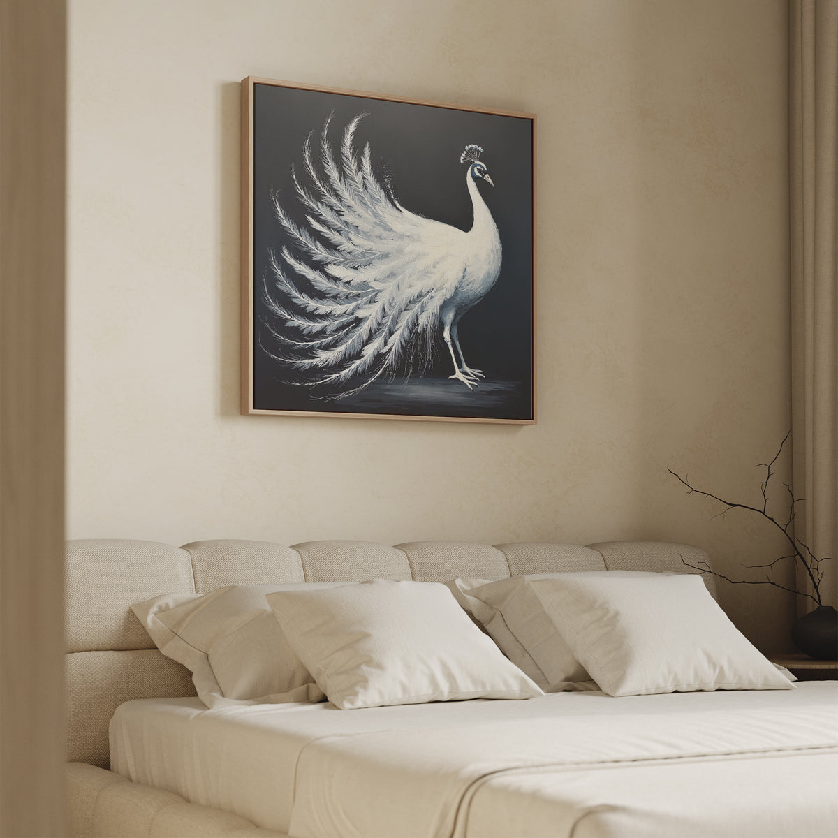 A beige, modern bedroom features a neatly made bed with four white pillows. Above the bed hangs the White Peacock Display Canvas Art - Square, while a bare decorative branch rests on the bedside table.