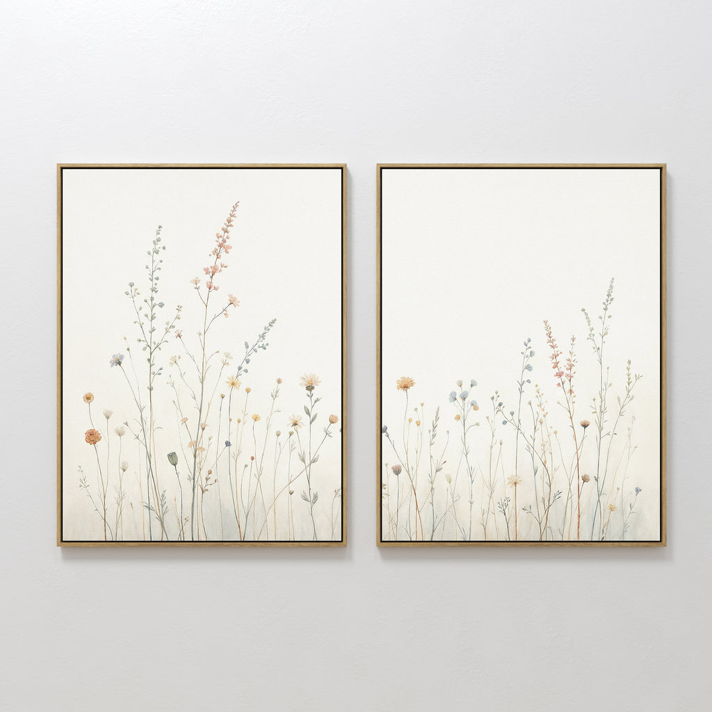 The Wildflower Dreams - Set of 2 features framed minimalist botanical prints with pastel wildflowers and slender stems on a neutral background, perfect for adding a serene Nordic Park touch to your space.