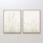 The Wildflower Dreams - Set of 2 features framed minimalist botanical prints with pastel wildflowers and slender stems on a neutral background, perfect for adding a serene Nordic Park touch to your space.