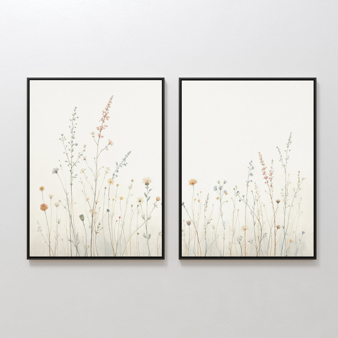 The Wildflower Dreams - Set of 2 features framed botanical wall art, each piece showcasing delicate wildflowers and grasses in soft, muted tones on a light background, displayed side by side on a white wall.