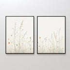 The Wildflower Dreams - Set of 2 features framed botanical wall art, each piece showcasing delicate wildflowers and grasses in soft, muted tones on a light background, displayed side by side on a white wall.