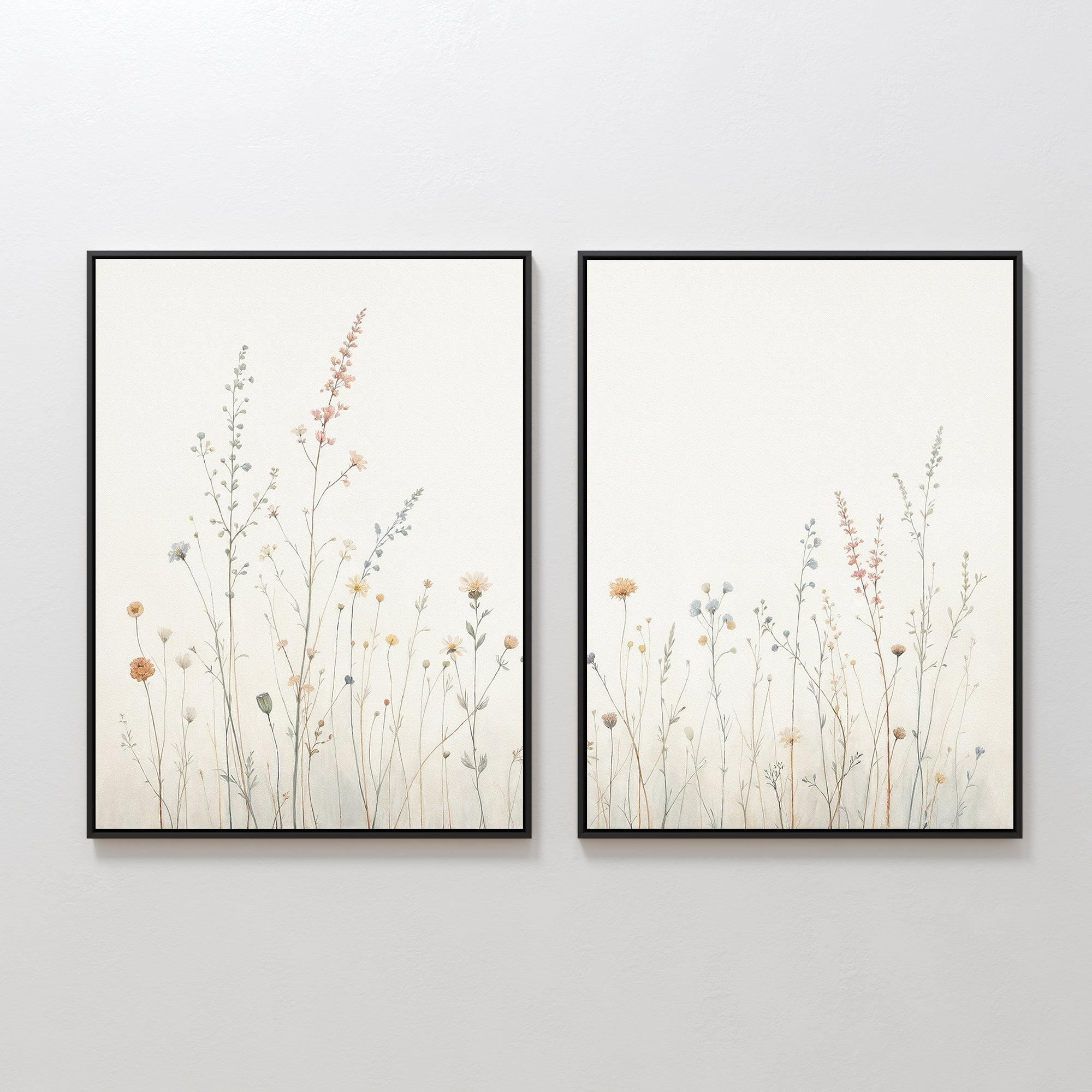 The Wildflower Dreams - Set of 2 features framed botanical wall art, each piece showcasing delicate wildflowers and grasses in soft, muted tones on a light background, displayed side by side on a white wall.