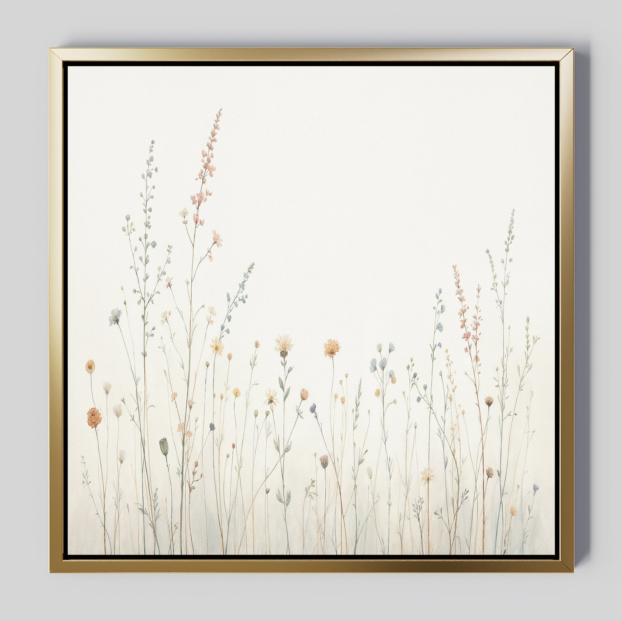 The Wildflower Dreams Canvas Art - Square showcases pastel wildflowers and grasses on an off-white background, elegantly framed in gold with a black inner edge—perfect for adding botanical charm to your wall.