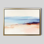 The Windswept Coastline Canvas Art - Horizontal features a serene abstract seascape in a gold frame, with soft blended blue, beige, peach, and purple tones on a light gray background.