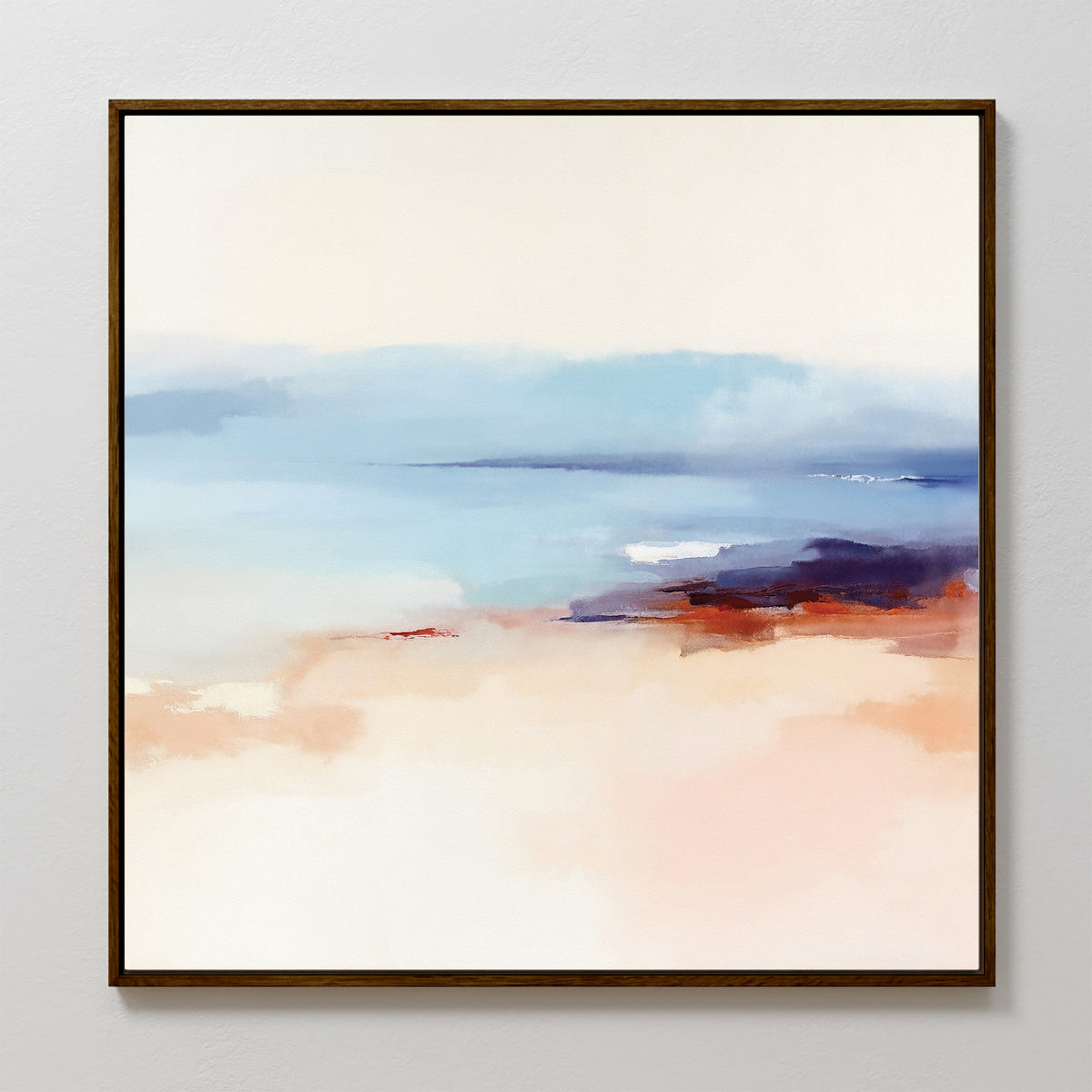 The Windswept Coastline Canvas Art - Square features an abstract landscape in soft pastel blue, peach, and white with accents of deep blue and rust, framed by a slim dark border for a serene coastal look.