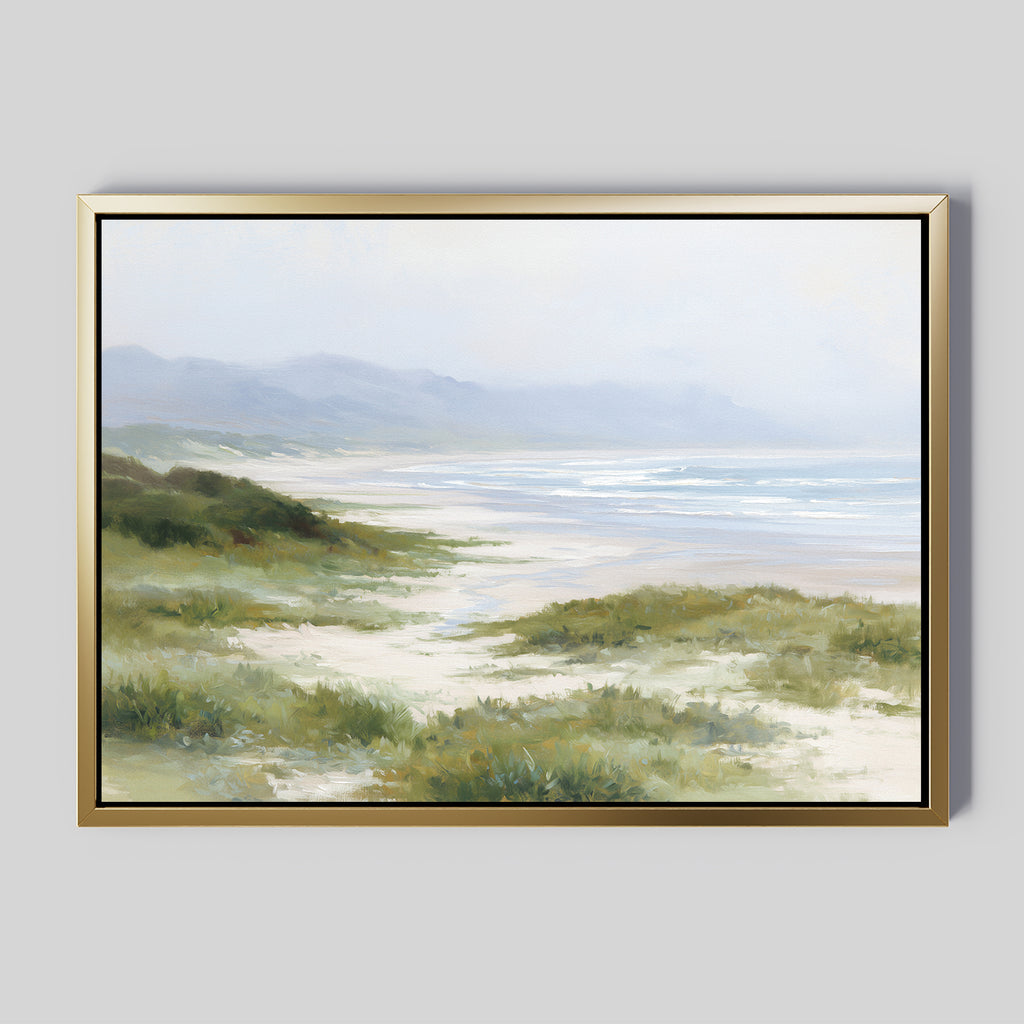 Windswept Dunes Canvas Art - Horizontal features a serene coastal landscape with grassy dunes, a sandy beach, gentle ocean waves, and distant mountains beneath a soft, hazy sky.