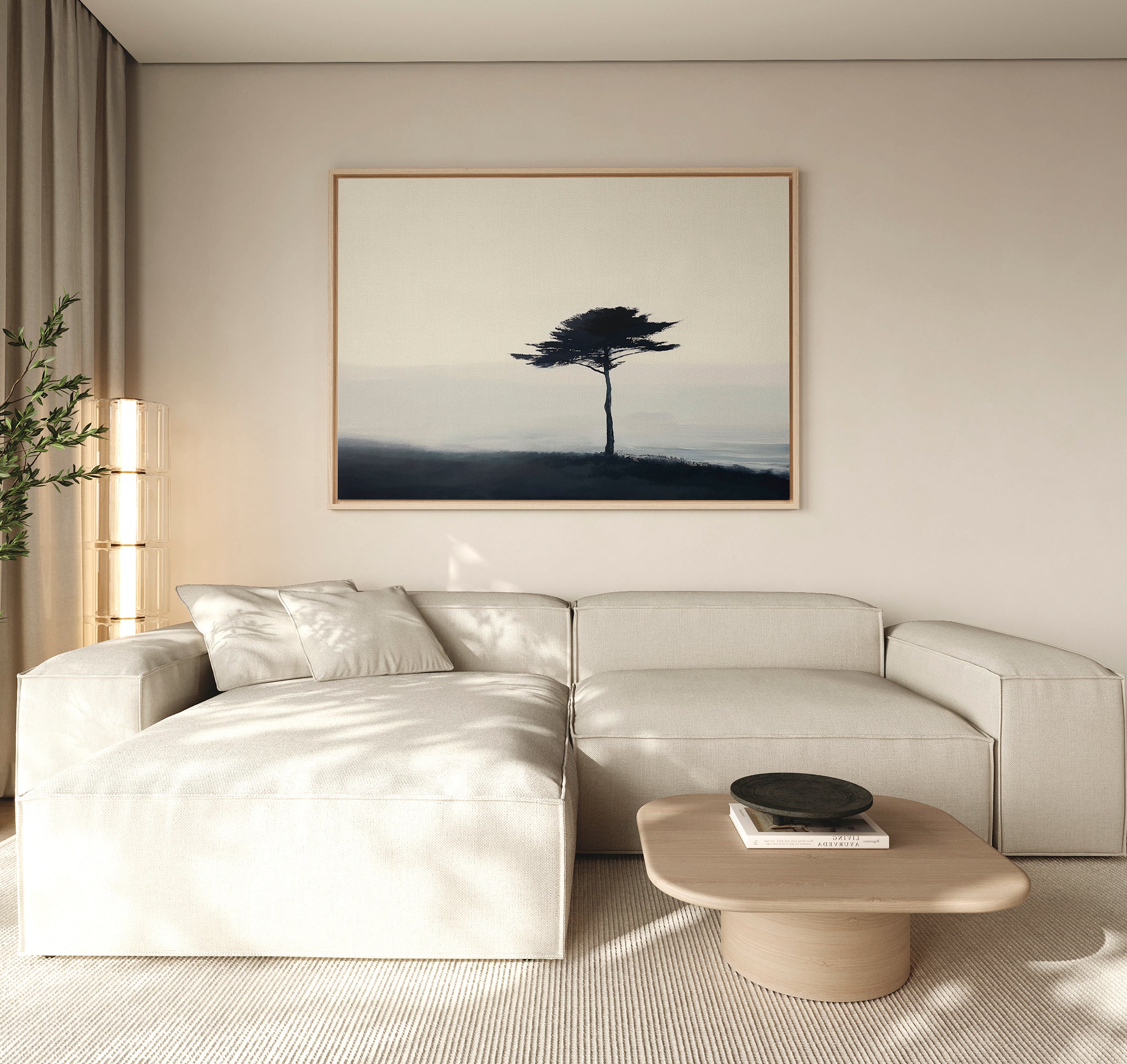 Minimalist living room with a light beige sectional, wooden coffee table with black bowl, neutral walls, tall beige curtains, potted plant in the corner, and Windswept Solitude Canvas Art - Horizontal as large framed wall décor.