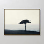 The Windswept Solitude Canvas Art - Horizontal features a solitary tree with sparse branches on a foggy blue-gray landscape—ideal minimalist wall art for modern living room decor.