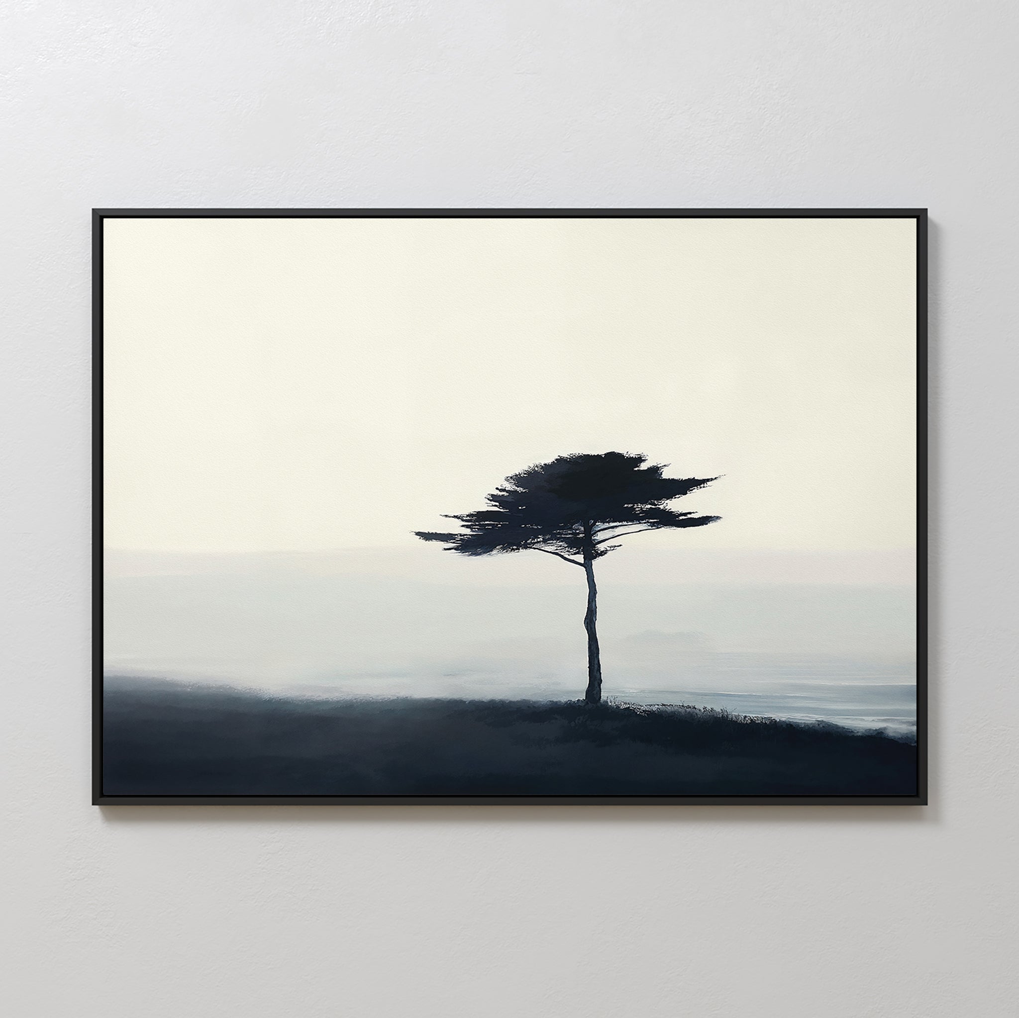 Windswept Solitude Canvas Art - Horizontal features a lone tree with dark trunk and broad branches on a misty, muted landscape. This moody artwork comes in a sleek black frame, perfect for modern living room decor.