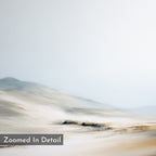 Winter Plains Canvas Art - Horizontal showcases a soft, abstract landscape in muted beige and gray tones with distant hills and a hazy sky. A gray box in the bottom left corner displays "Zoomed In Detail" text for added interest.