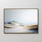 The Winter Plains Canvas Art - Horizontal is a serene abstract wall piece showcasing gentle sand dunes beneath a pale sky, with subtle blends of beige, white, gray, and light brown for a tranquil touch to any space.