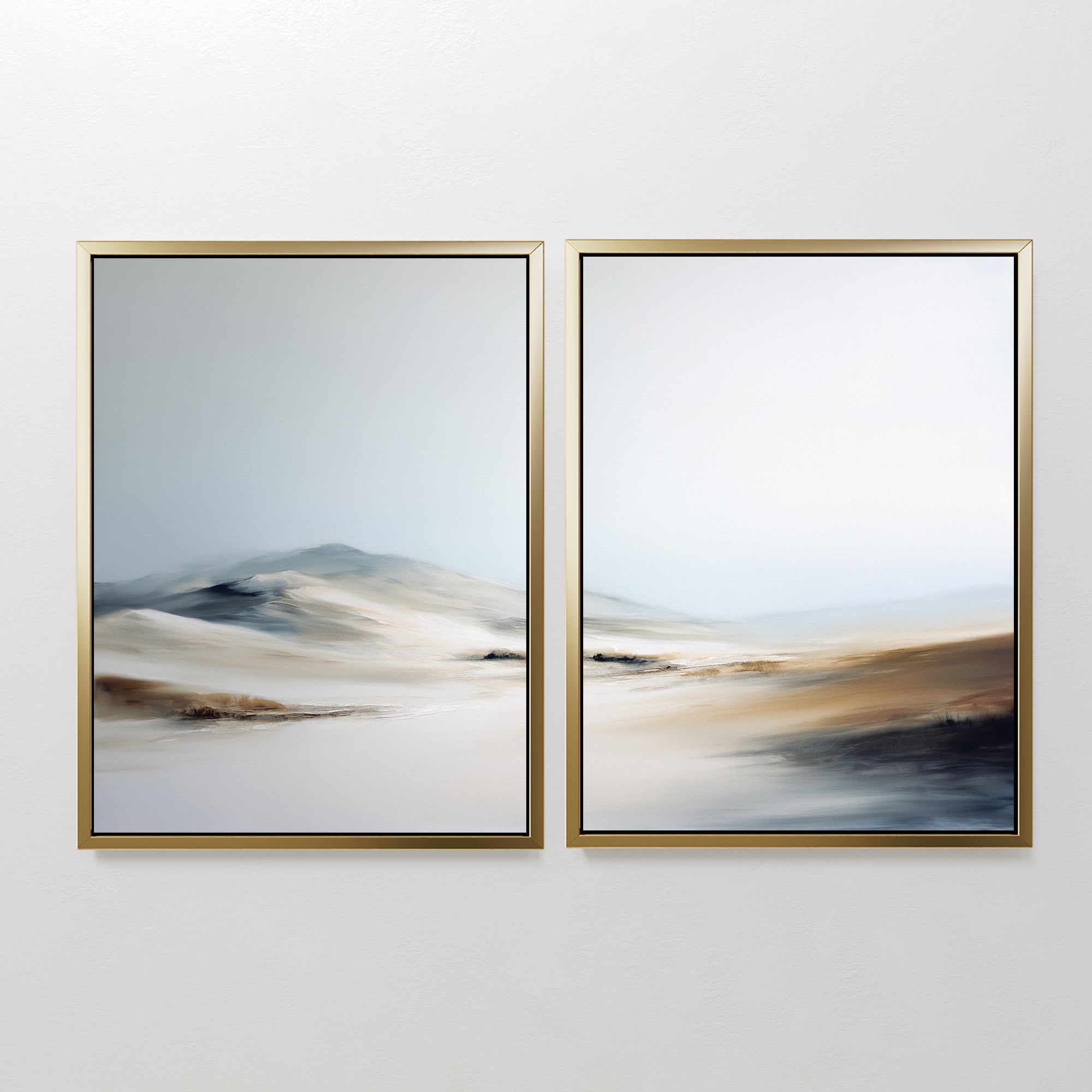 The "Winter Plains - Set of 2" features framed abstract landscape prints in soft beige, white, blue, and brown tones, creating a serene, misty vibe—ideal wall art to bring calm to any space.
