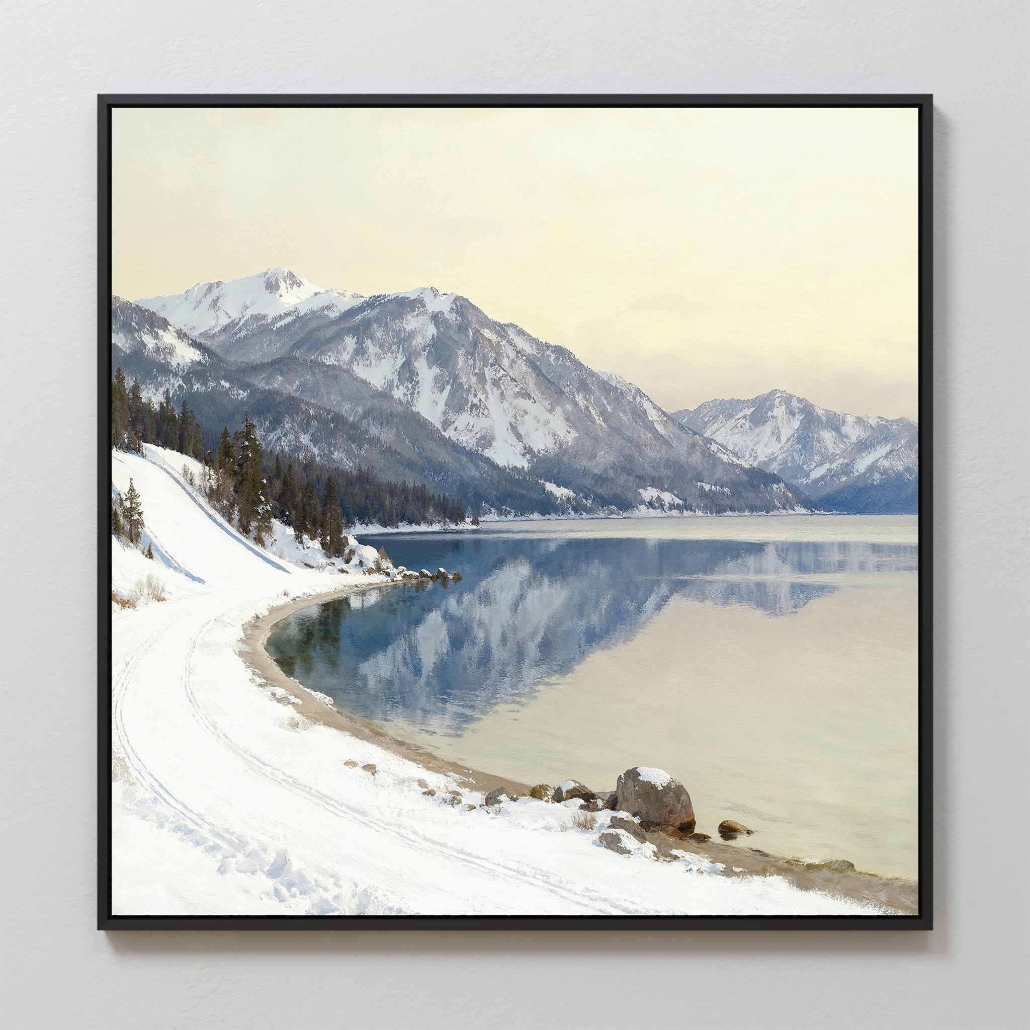 Winter Reflection Canvas Art - Square: A framed canvas print of a tranquil winter landscape with snow-capped mountains, evergreen trees, and a peaceful alpine lake mirroring Nordic Park under a cloudy sky.