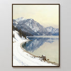 Winter Reflection Canvas Art - Vertical features a snow-covered lakeshore with a winding path, pine trees, and distant mountains mirrored in calm water—stunning alpine lake wall art for your home.