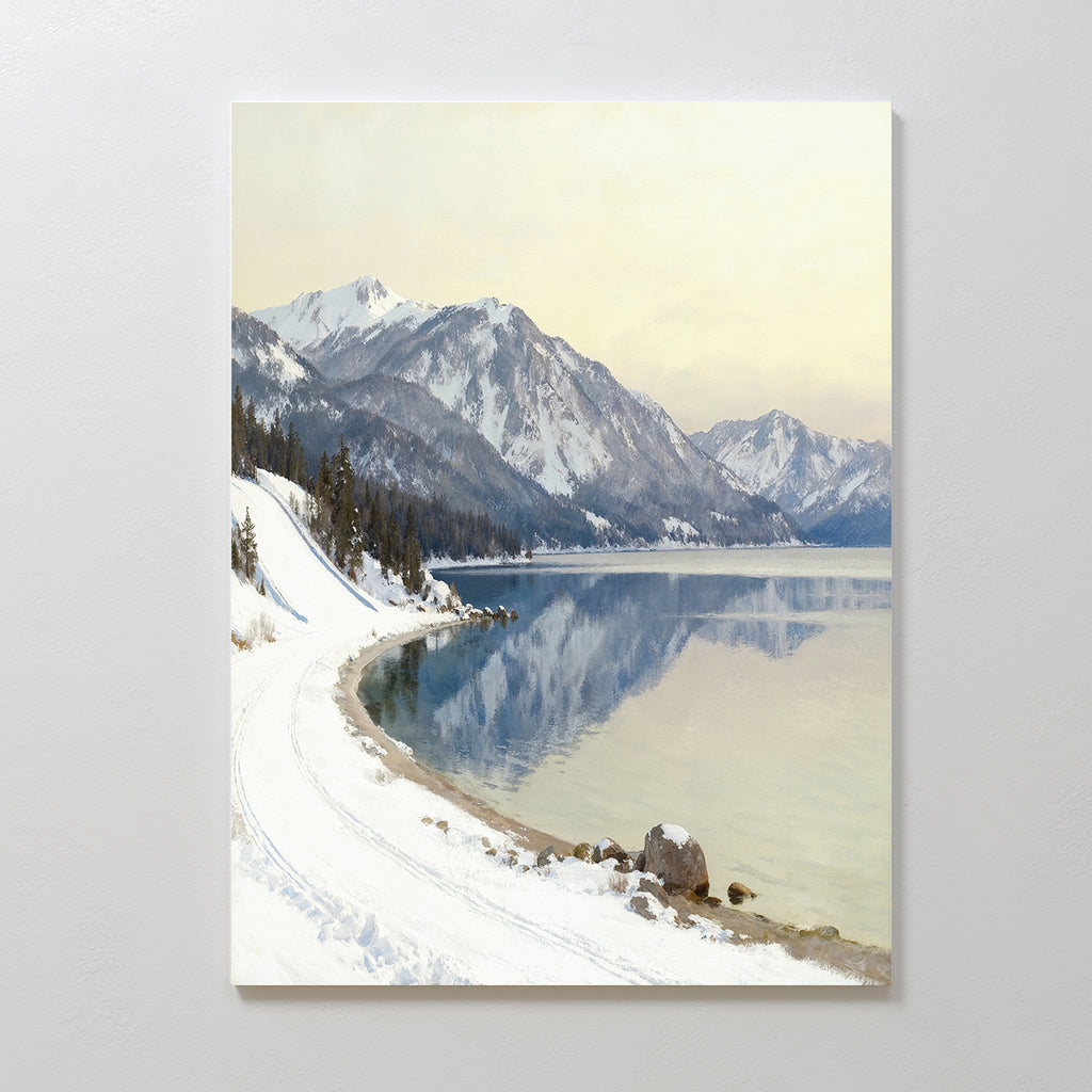 The Winter Reflection Canvas Art - Vertical features a snowy landscape with a winding path, alpine lake, and mountain reflections—a serene winter scene perfect for Nordic Park-inspired decor.