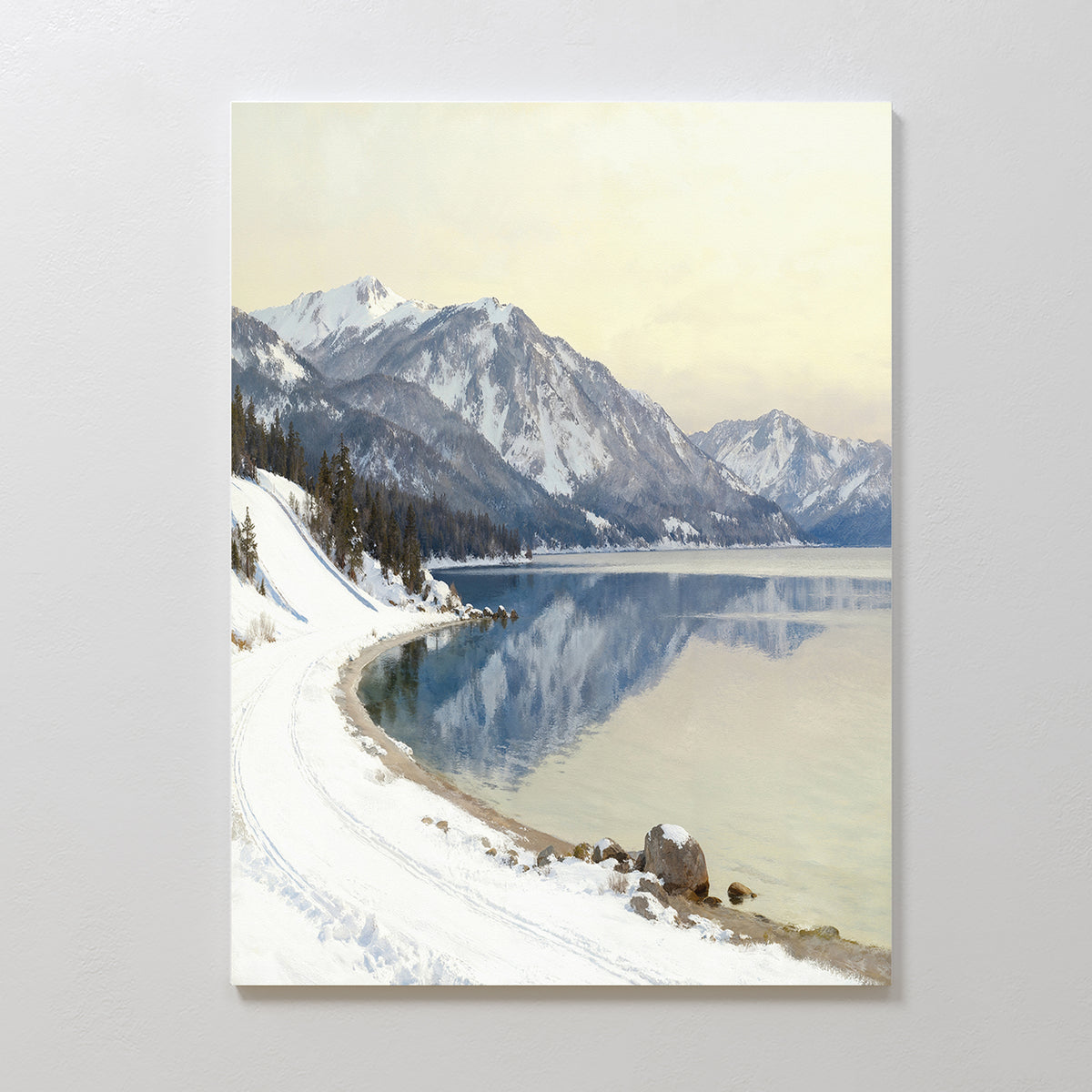 The Winter Reflection Canvas Art - Vertical features a snowy landscape with a winding path, alpine lake, and mountain reflections—a serene winter scene perfect for Nordic Park-inspired decor.