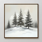The Winter Solitude Canvas Art - Square features a framed monochromatic snowy landscape with tall evergreens on a gentle hill beneath a cloudy sky—ideal as winter landscape wall art.