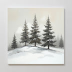 The Winter Solitude Canvas Art - Square features a serene winter landscape of snow-covered ground and evergreens on a hill, with a misty, muted background that evokes a cold and tranquil atmosphere.